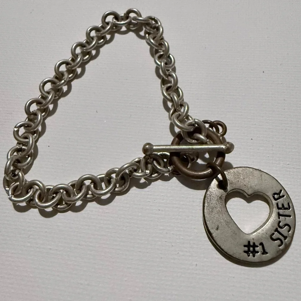 Vintage #1 sister chain bracelet with barbell closure. Printed on both sides